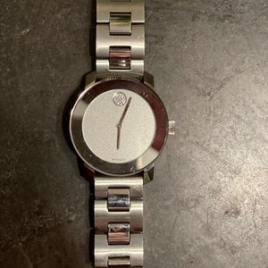 Movado woman’s silver watch.